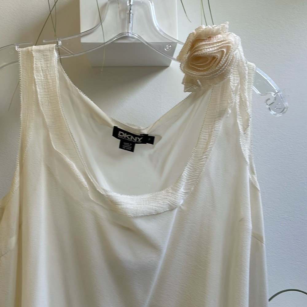 DKNY silk ivory blouse with attachable flower.